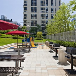 Grilling station and lush landscaping
