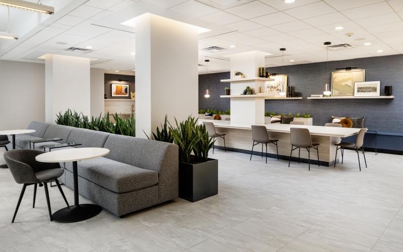 a room with a table, chairs and a couch