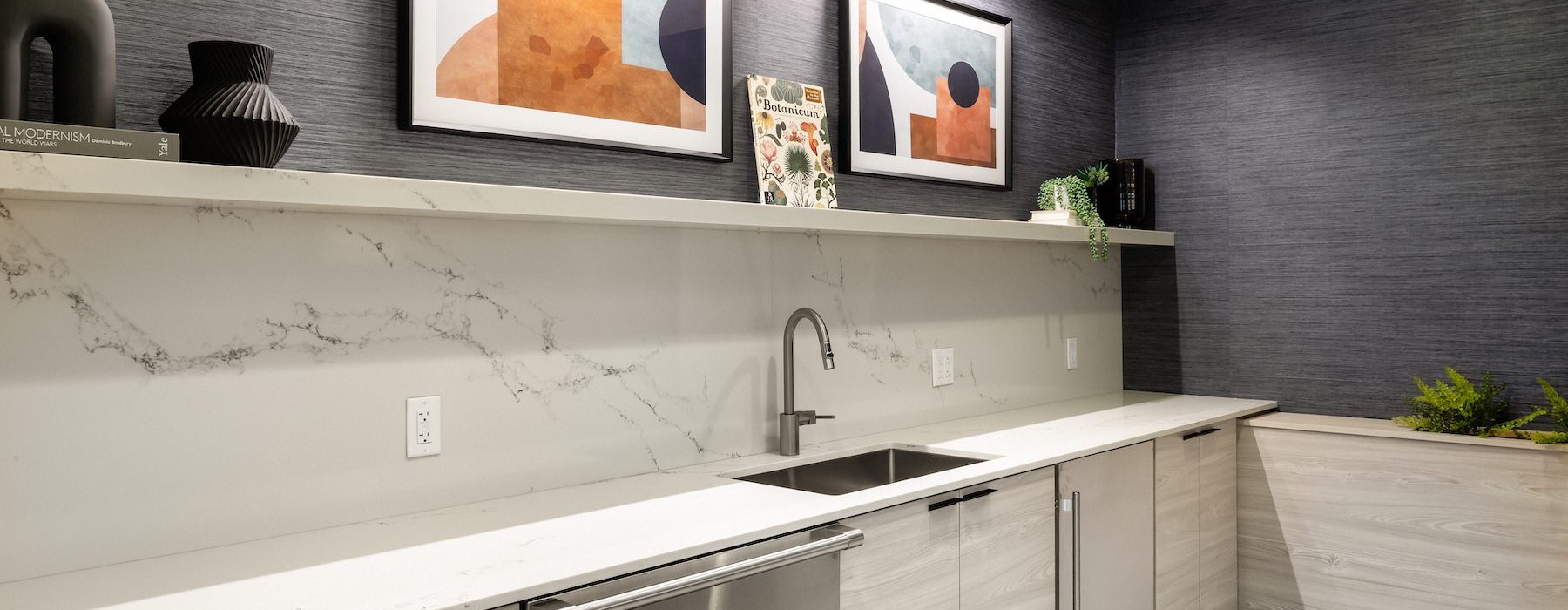 a kitchen with a sink and cabinets